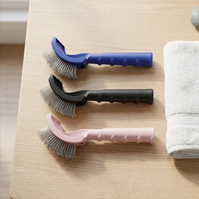 Brosse pour chat poil long bleue noire rose table